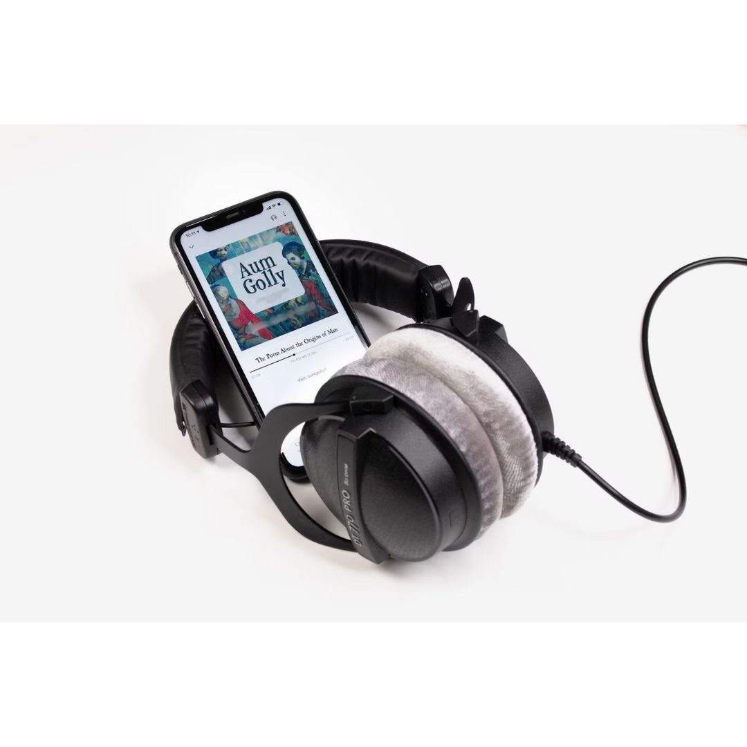 Picture of headphones and phones showcasing an Audiobooks App